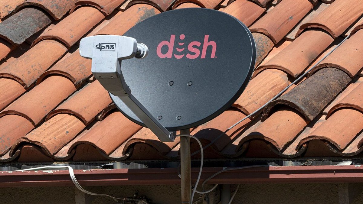 <i>David Paul Morris/Bloomber/Getty Images/FILE</i><br/>Dish Network is the first company to be fined by the FCC for improper satellite disposal. One of the company's satellite dishes is seen on the roof of a home in Crockett