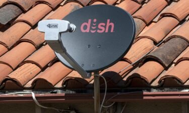 Dish Network is the first company to be fined by the FCC for improper satellite disposal. One of the company's satellite dishes is seen on the roof of a home in Crockett