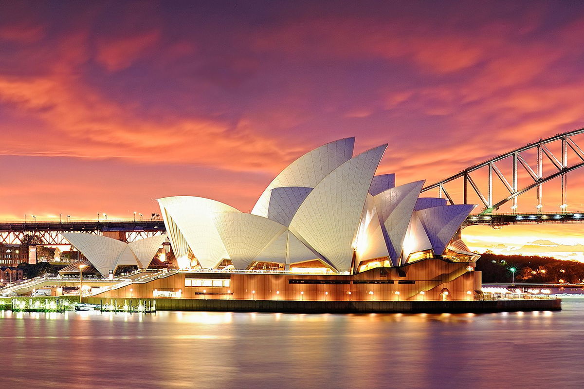 <i>AtomicZen/Moment RF/Getty Images</i><br/>Panoramic scenery of Sydney harbour and Sydney opera house