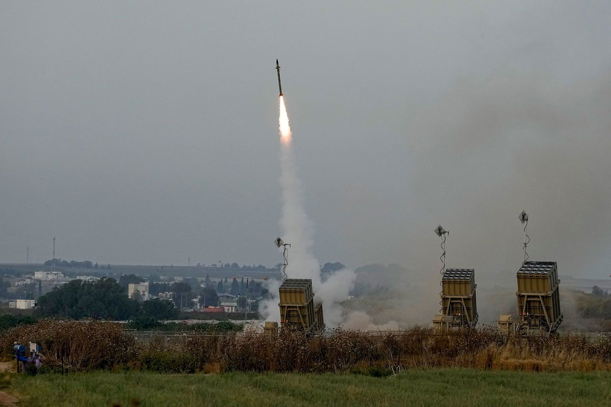 <i>Ohad Zwigenberg/AP/File</i><br/>Israel's Iron Dome anti-missile system fires to intercept a rocket launched from the Gaza Strip towards Israel