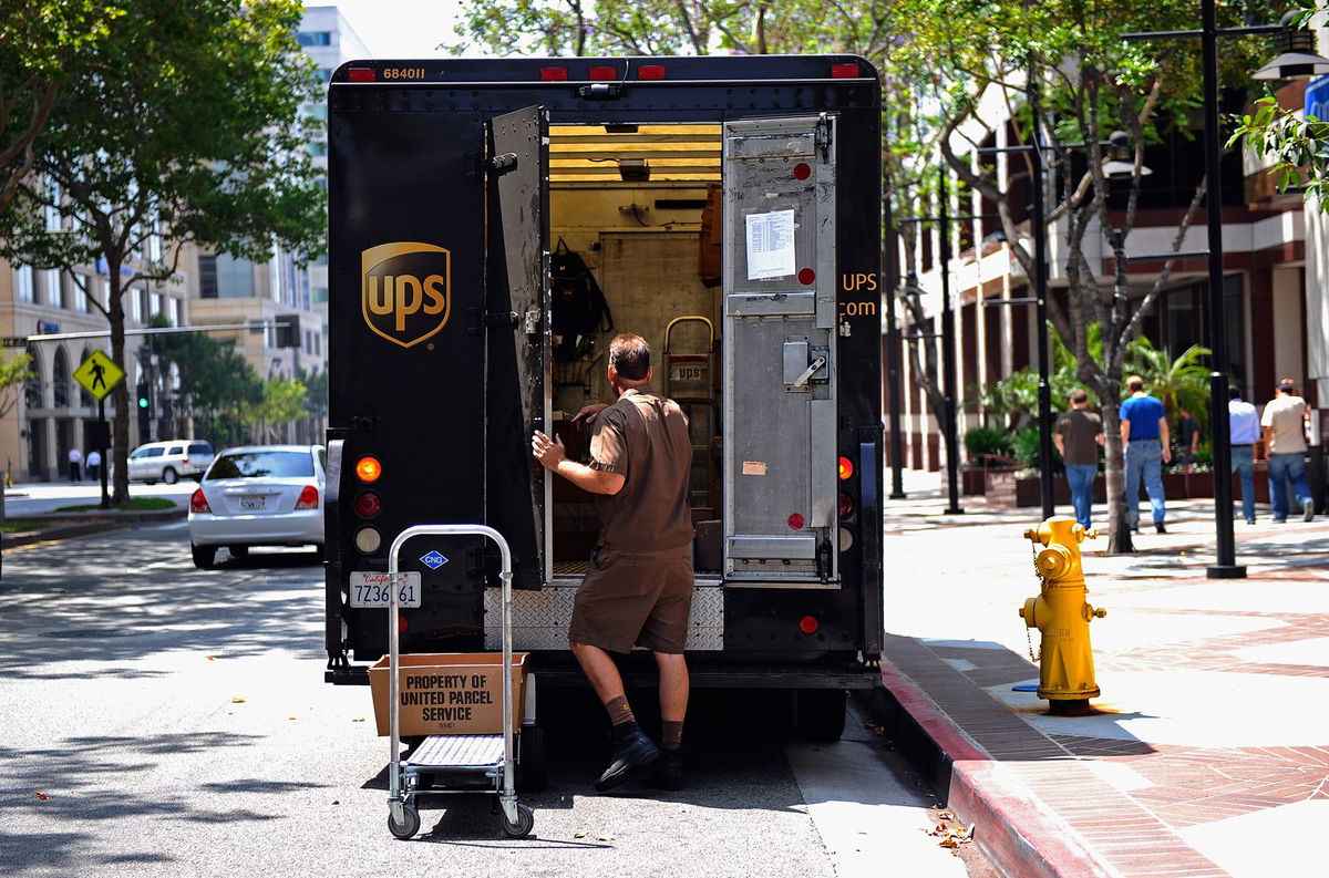 <i>Kevork Djansezian/Getty Images</i><br/>A UPS driver walks back to his truck after making a delivery in Glendale