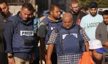 Al Jazeera journalist Wael Al-Dahdouh attends the funeral ceremony of his wife