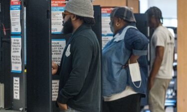 Community members arrive at their local polling location to vote in November 2022