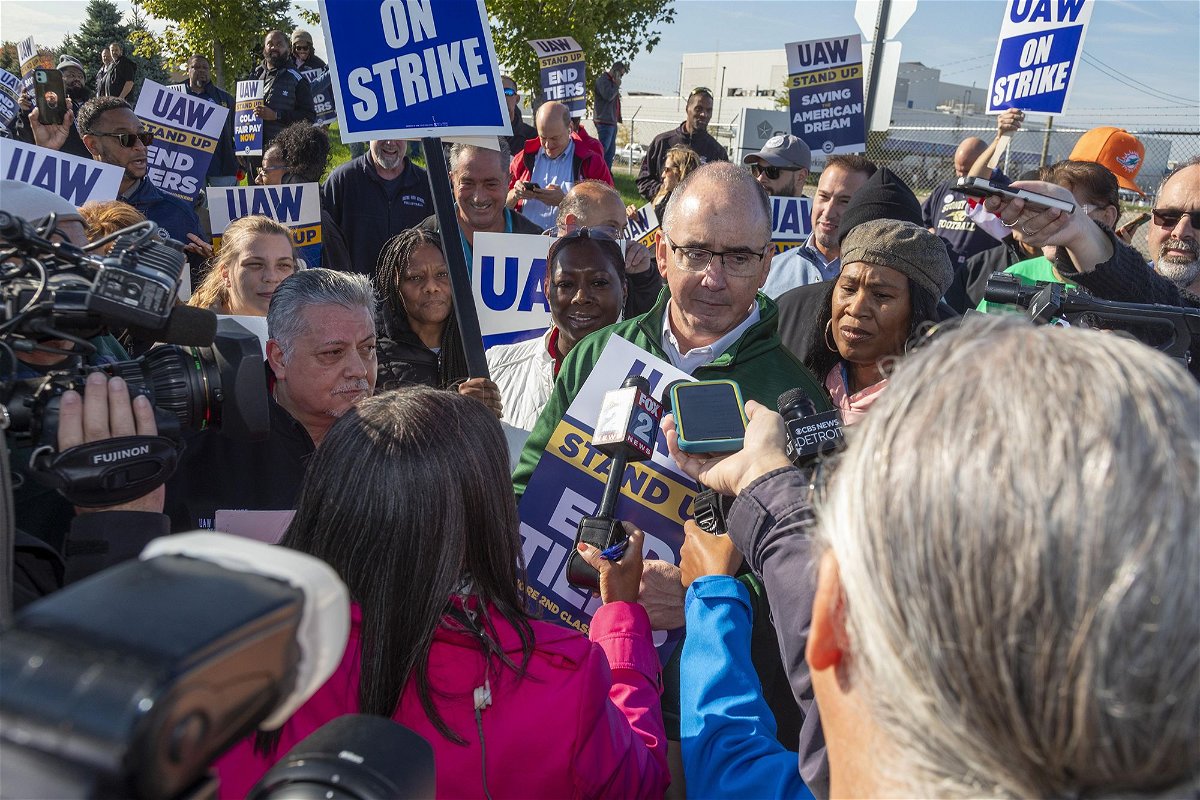 <i>Jim West/imageBROKER/Shutterstock</i><br/>United Auto Workers President Shawn Fain at the picket line at the Stellantis plant in Sterling Heights Michigan on Monday. The union is reportedly getting close to to deals to end strikes at both GM and Stellantis.