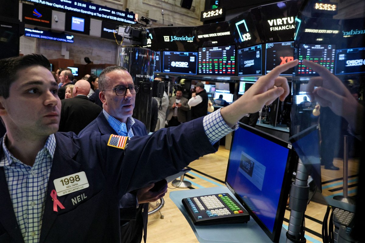 <i>Brendan McDermid/Reuters</i><br/>S&P 500 enters correction territory to close volatile trading week and seen here traders work on the floor at the New York Stock Exchange on October 27.