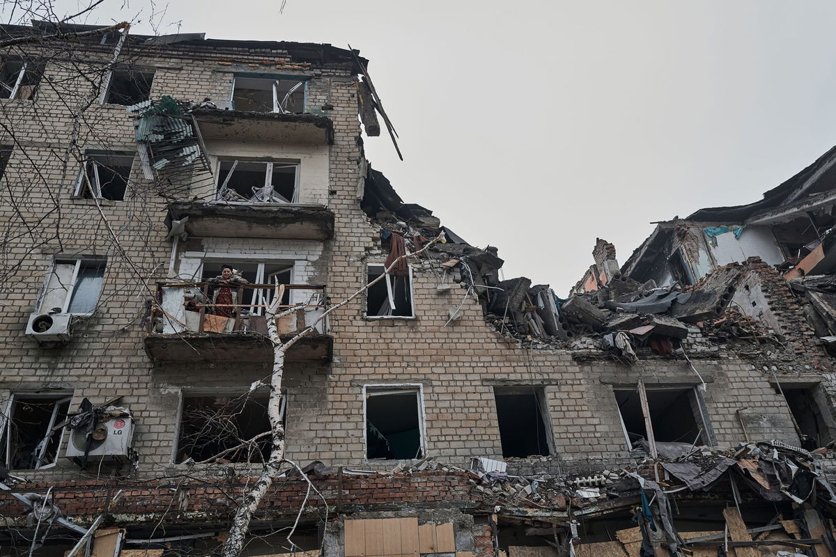 <i>Vlada Liberova/Libkos/Getty Images</i><br/>Two Ukrainian soldiers walk along the destroyed city in the fog on Thursday in Avdiivka