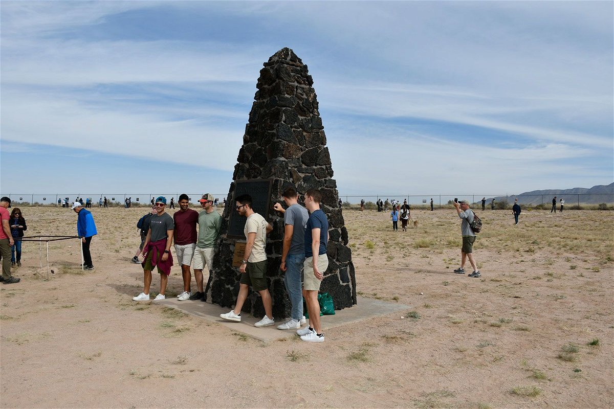 <i>Jim Cutler/White Sands Test Center Material Test Directorate</i><br/>Visitors tour the Trinity Site on October 21.