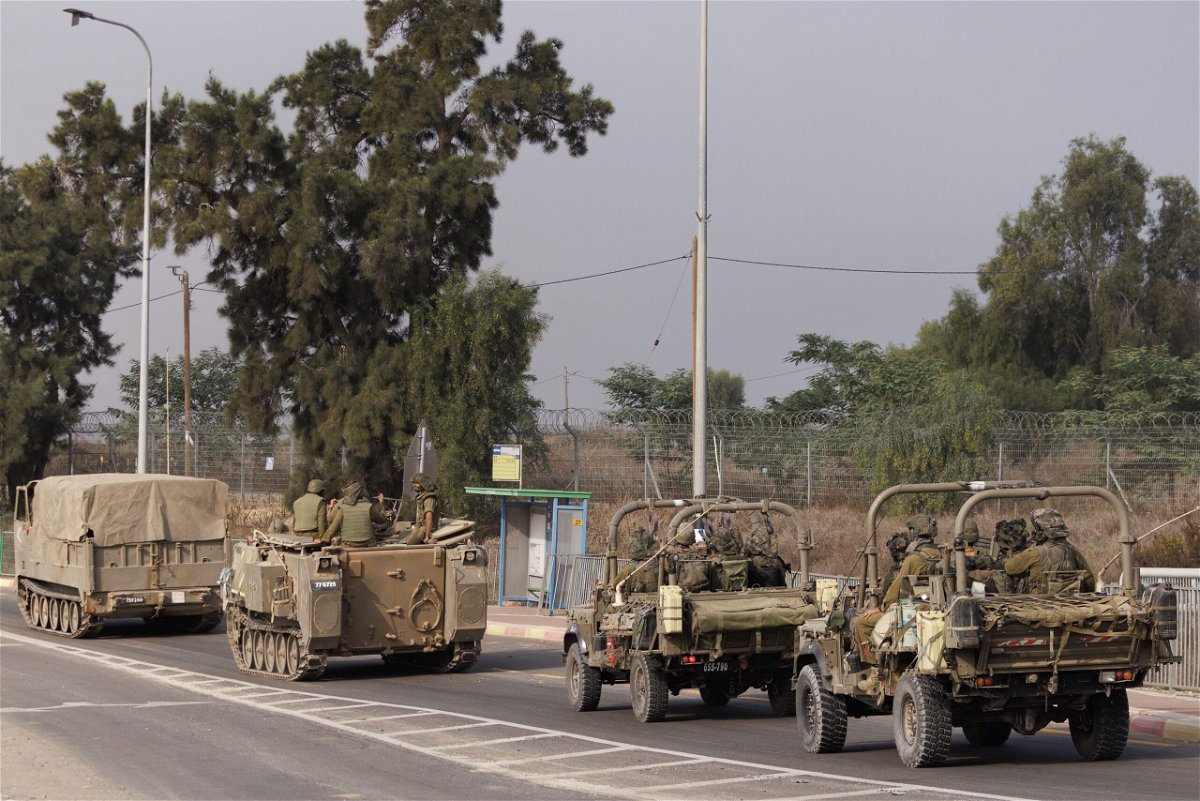 <i>Dan Kitwood/Getty Images</i><br/>Israeli tanks and troops move near the border with Gaza on October 28