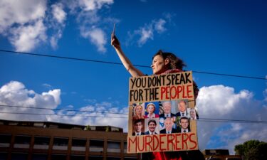 People take part in a protest in support of the Palestinian people in New York on Saturday.