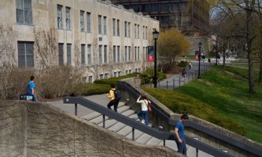 Students walk through the Cornell University campus in Ithaca