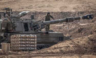 Israeli tanks and other military vehicles maneuver inside Gaza