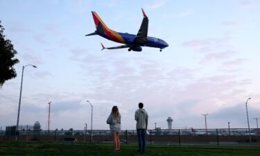 A Southwest Airlines plane lands in Los Angeles