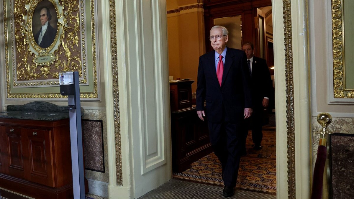 <i>Kevin Dietsch/Getty Images</i><br/>Senate Minority Leader Mitch McConnell walks from the Senate Chambers at the Capitol on September 6
