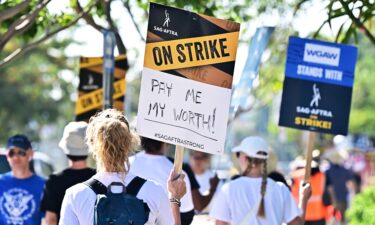 SAG-AFTRA members picket outside of Netflix's building on day 99 of their strike against the Hollywood studios in Hollywood