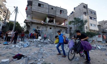 Palestinians leave their homes following Israeli bombardments on Gaza