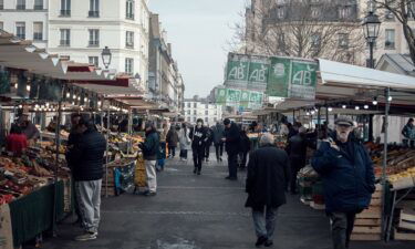 Shoppers at the Bauveau Market in Paris