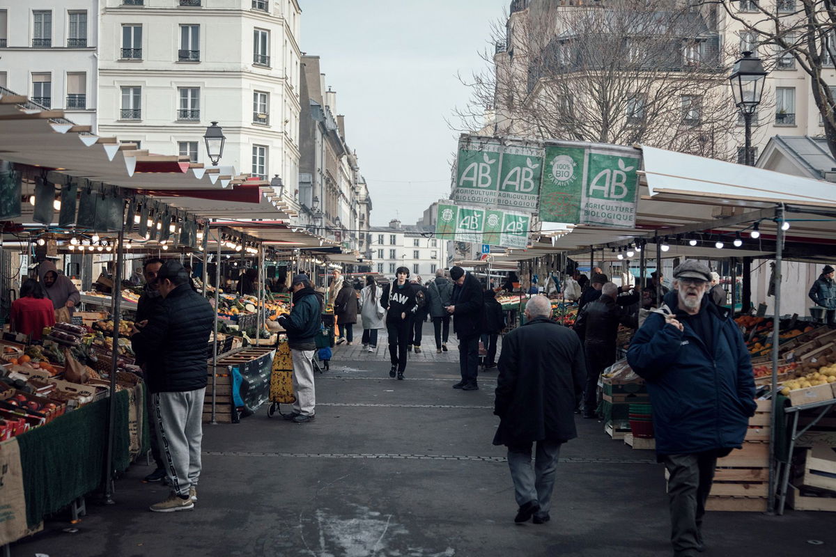 <i>Cyril Marcilhacy/Bloomberg/Getty Images</i><br/>Shoppers at the Bauveau Market in Paris