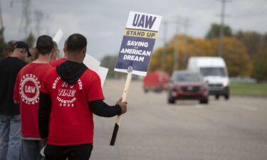 United Auto Workers members strike the General Motors Lansing Delta Assembly Plant on September 29 in Lansing