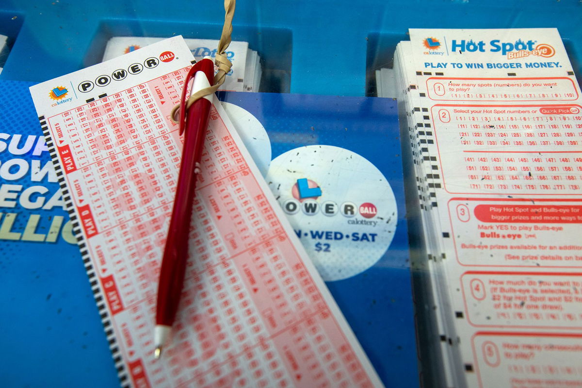 <i>Francine Orr/Los Angeles Times/Getty Images</i><br/>Powerball and Mega Millions lotto tickets are sold at Foremost Liquor Store on Sunday