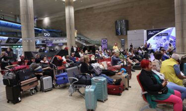 Passengers wait at Ben Gurion Airport near Tel Aviv