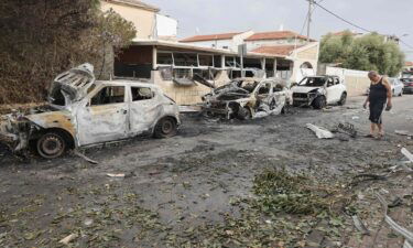 A man inspects the damage in the southern Israeli city of Ashkelon after a rocket attack from Gaza on October 9.