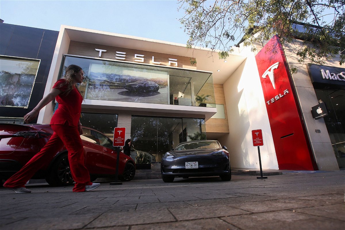 <i>Quetzalli Nicte-Ha/Reuters</i><br/>Tesla reported slower third quarter sales that fell short of Wall Street forecasts. Pictured is a Tesla dealership in Mexico City