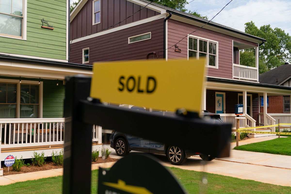 <i>Elijah Nouvelage/Bloomberg/Getty Images</i><br/>A sign outside a home for sale in Atlanta