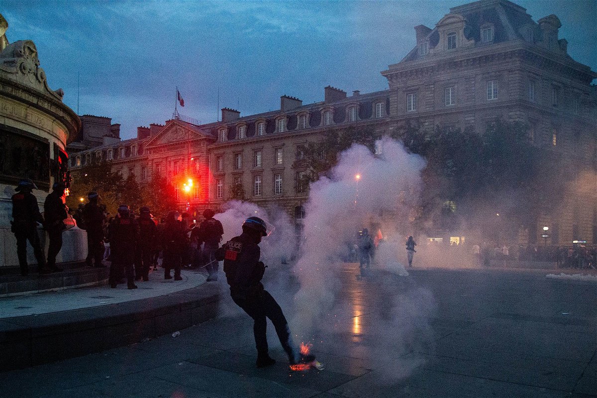 <i>Ibrahim Ezzat/Anadolu/Getty Images</i><br/>French riot police disperse demonstrators in Paris on October 12.