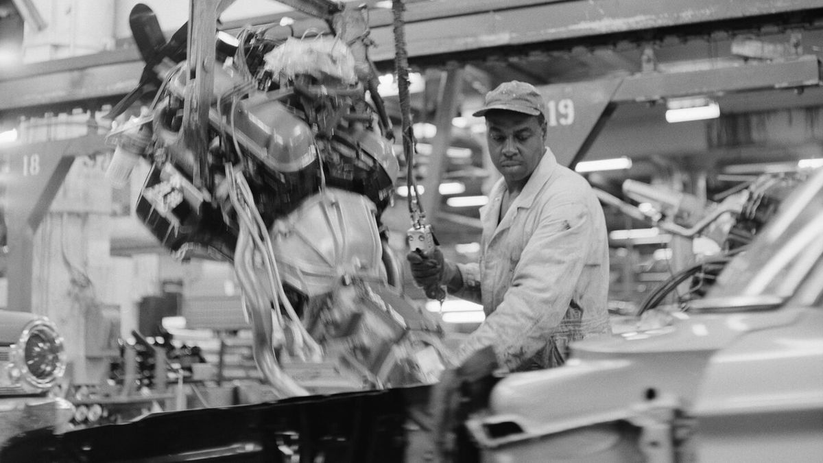 <i>Scott Olson/Getty Images</i><br/>Workers assemble Ford vehicles at the Chicago Assembly Plant on June 24