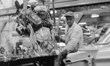 Workers assemble Ford vehicles at the Chicago Assembly Plant on June 24