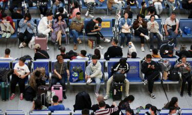 Passengers waiting for trains on October 6