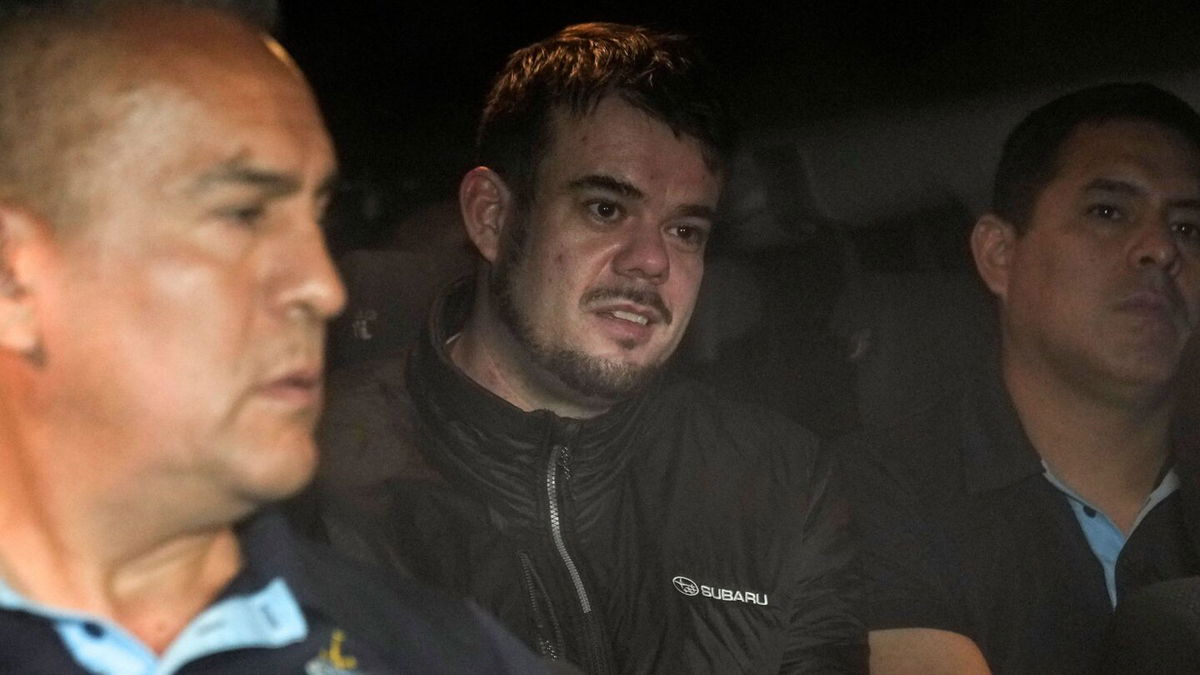 <i>Martin Mejia/AP</i><br/>Dutch citizen Joran van der Sloot is driven June 8 from a Peruvian maximum-security prison to be extradited to the US.