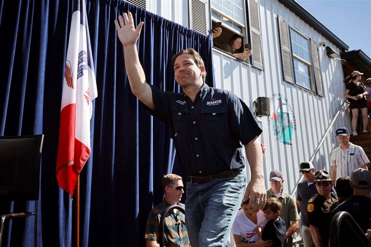 <i>Chip Somodevilla/Getty Images</i><br/>Florida Gov. Ron DeSantis takes the stage at the Iowa State Fair in Des Moines on August 12.