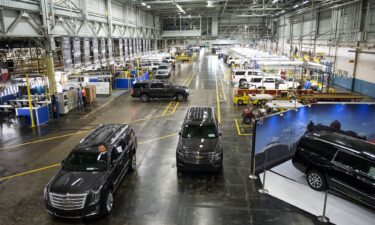 Vehicles brought in for repairs are looked over at the General Motors Co. (GM) assembly plant in Arlington