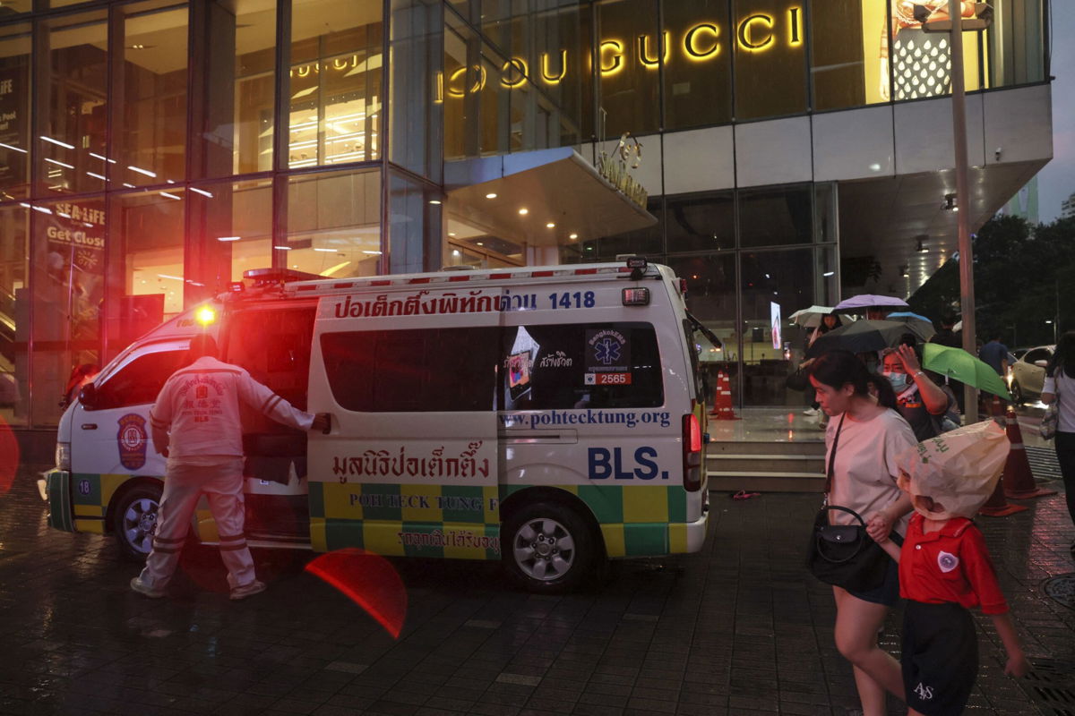<i>Jack Taylor/AFP/Getty Images</i><br/>Emergency services arrive after a deadly shooting at a shopping mall in central Bangkok