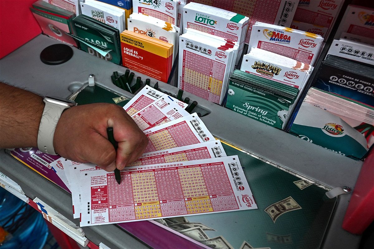 <i>Giorgio Viera/AFP/Getty images</i><br/>Powerball lottery tickets are seen inside a store in Homestead
