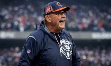 Dick Butkus cheers before an playoff game between the Chicago Bears and the Philadelphia Eagles in January 2019. Butkus has died at the age of 80