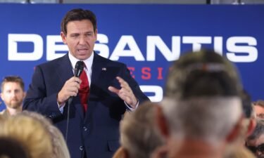 Florida Gov. Ron DeSantis speaks to guests during a campaign event at Refuge City Church on October 8