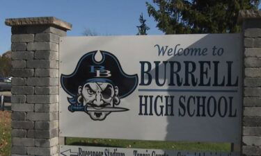 The Burrell High School football coach says his players were targets of racial slurs during a playoff game last week.