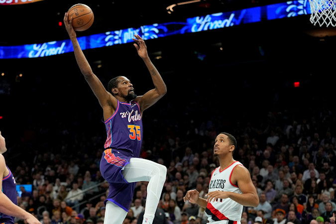 Phoenix Suns forward Kevin Durant (35) dunks against the Portland Trail Blazers during the second half of an NBA In-Season Tournament basketball game, Tuesday in Phoenix