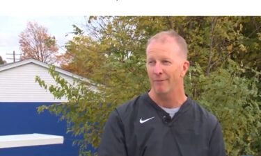 A Kentucky father and athletic trainer was saved by CPR and AED.