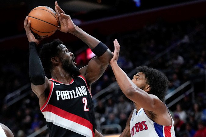 Portland Trail Blazers center Deandre Ayton (2) shoots on Detroit Pistons forward Marvin Bagley III (35) in the first half of Wednesday night's NBA contest in Detroit