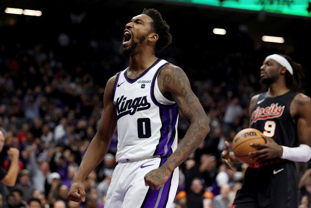 Sacramento Kings guard Malik Monk (0) celebrates after scoring against the Portland Trail Blazers during the second half of Wednesday night's game in Sacramento