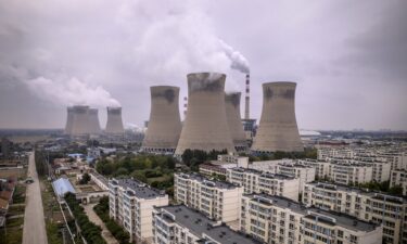 Smoke stacks and cooling towers at the Jon Amos coal-fired power plant in West Virginia.