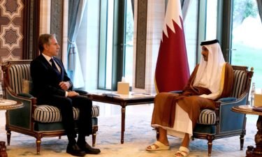 Secretary of State Antony Blinken and Qatari Emir Sheikh Tamim bin Hamad Al Thani attend a meeting in Lusail