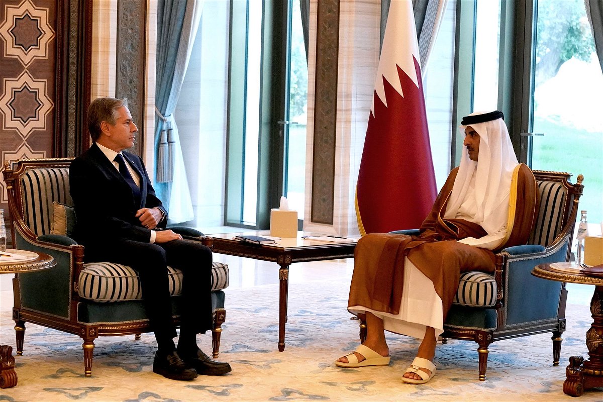 <i>Jacquelyn Martin/Reuters</i><br/>Secretary of State Antony Blinken and Qatari Emir Sheikh Tamim bin Hamad Al Thani attend a meeting in Lusail
