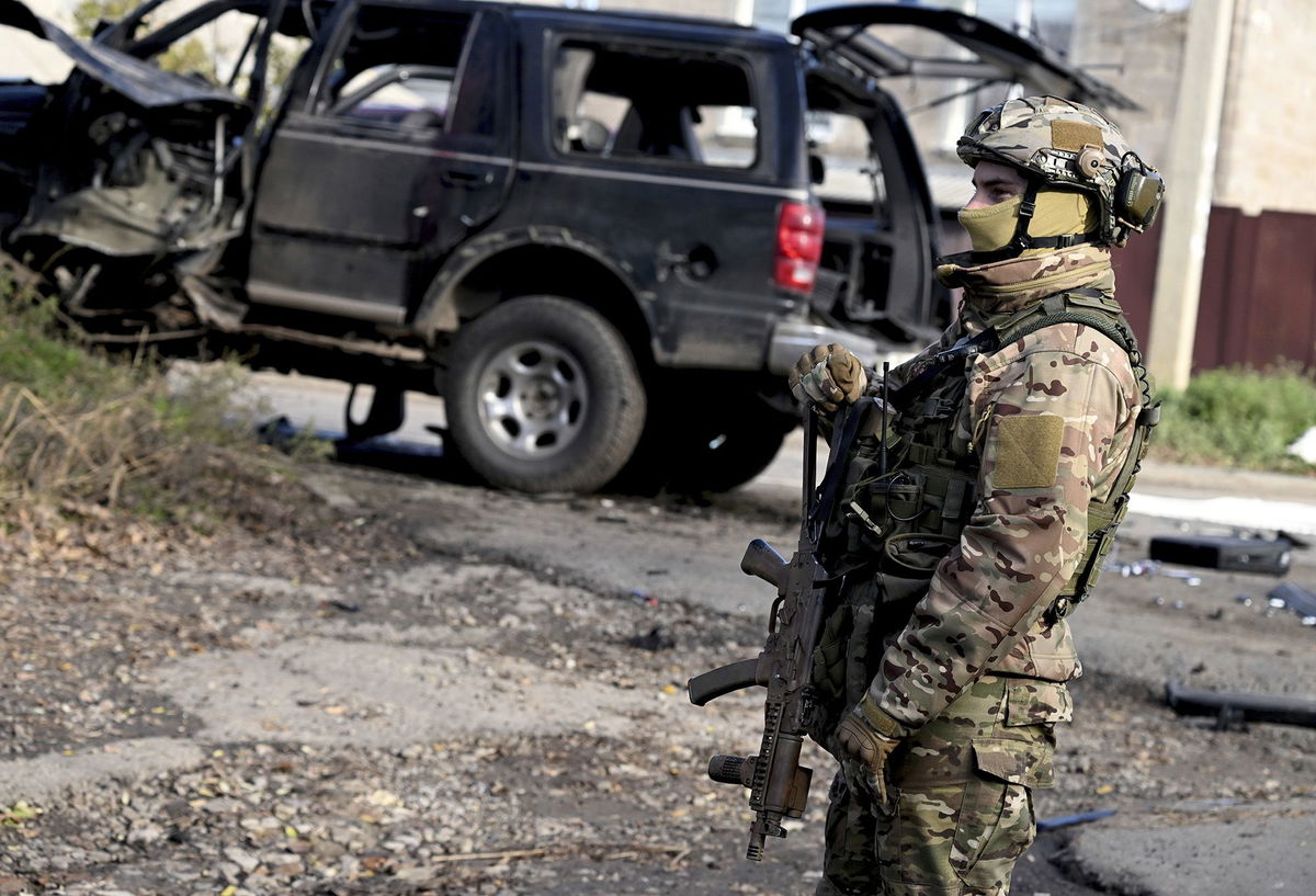 <i>Stanislav Krasilnikov/SPTNK/Sputnik via AP</i><br/>A view shows the scene of a car bomb explosion which killed the former head of the so-called People’s Militia of the Russian-backed Luhansk People’s Republic (LPR)