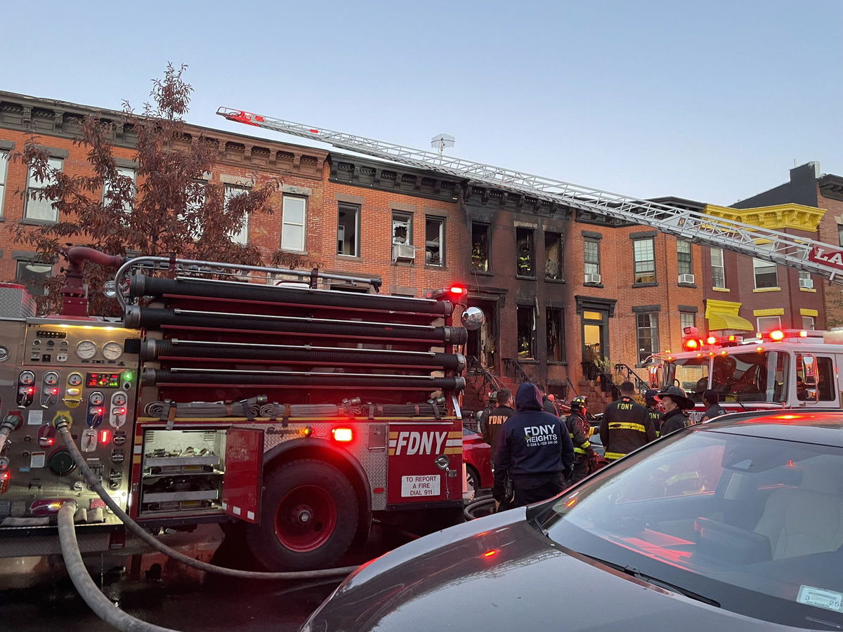 <i>New York City Fire Department</i><br/>Firefighters battled flames on all three floors of the Albany Avenue brownstone.