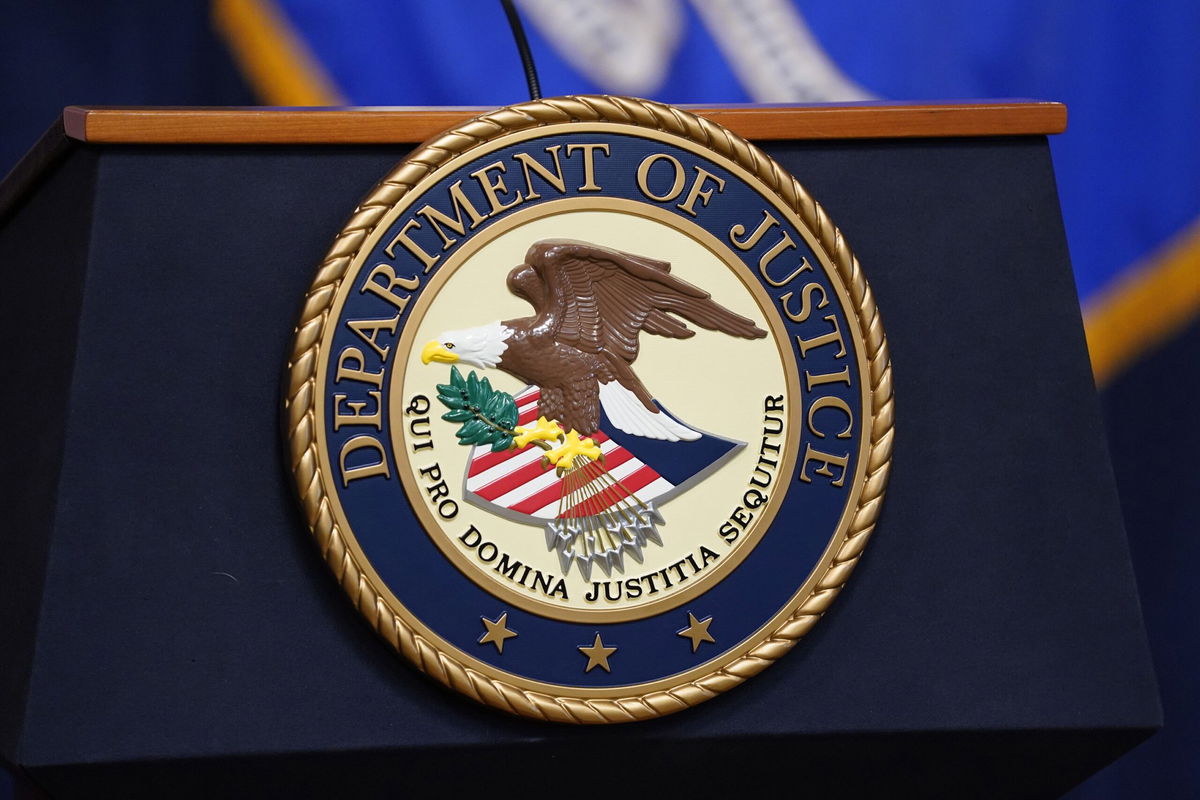 <i>Evan Vucci/AP</i><br/>The seal for the United States Department of Justice is displayed on a podium before a news conference at the Justice Department in Washington