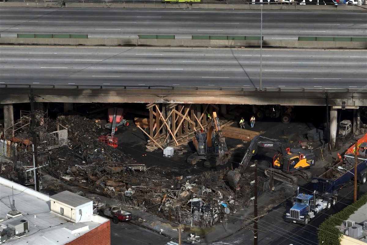 <i>Jae C. Hong/AP</i><br/>An aerial view of a fire site under Interstate 10 is shown on Monday in Los Angeles.